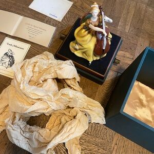 Royal doulton cello lady musicians statue